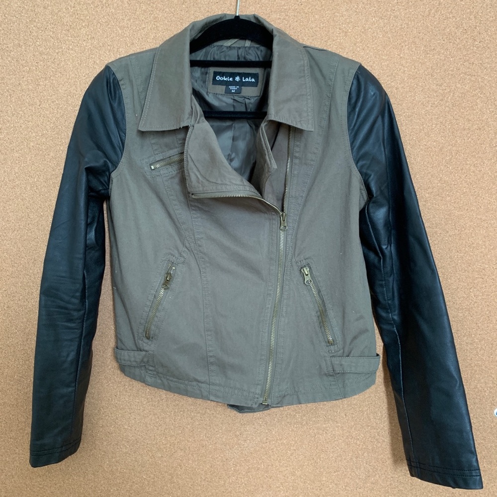 Moto jacket with contrast vegan leather sleeves.